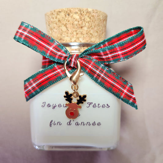 Bougie à message Joyeuses fêtes de fin d'année avec nœud décoratif.