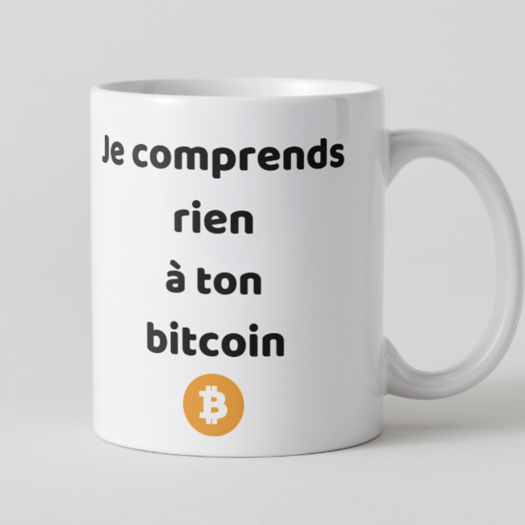 Mug blanc en céramique avec texte humoristique "Je comprends rien à ton Bitcoin" et logo Bitcoin orange, fait main par Mamie Candle.