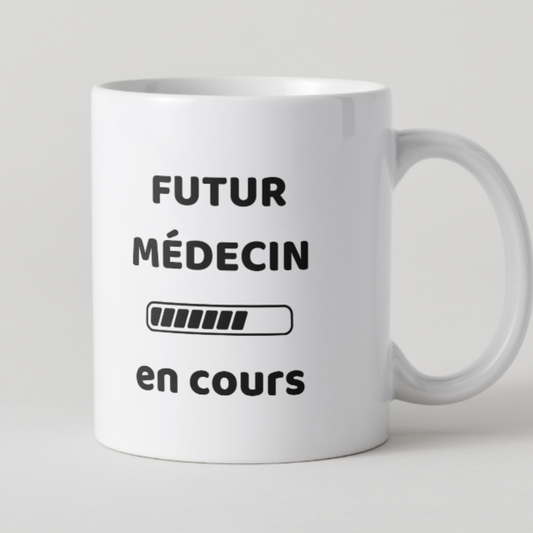 Mug blanc texte noir Futur médecin en cours avec barre de chargement.