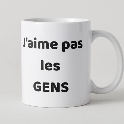 Mug blanc avec texte noir J'aime pas les gens, style minimaliste et humoristique